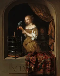 Een vrouw die een papegaai voedt, met een page