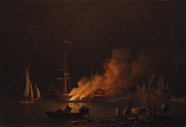 Schip in brand bij nacht