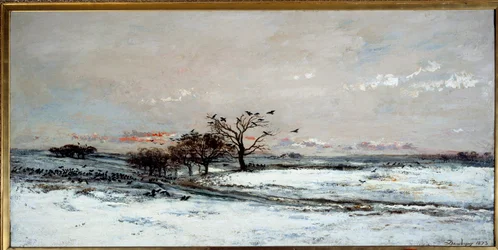 Sneeuwlandschap in de ondergaande zon