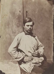 Portret van een jonge man in een blouse