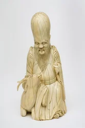 Gesneden ivoren figuur van Shou Xing zittend met hert, c.1580-1644