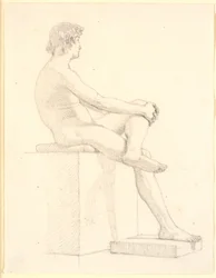 Jonge, zittende mannelijke model