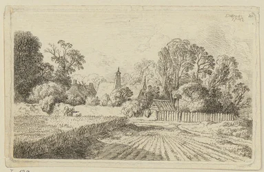 Een pad naast een korenveld