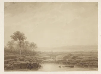 Landschap met rotsen bij water