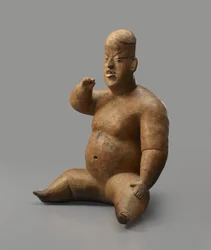 Zittend figuur