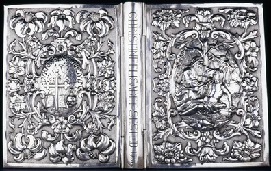 Boven- en onderboekomslag met loofwerk en een afbeelding van de barmhartige Samaritaan, 1740