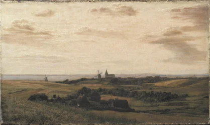 Een uitzicht richting Assens in Funen. In de verte de kust van Sleeswijk