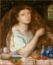 Vrouw die haar haar kamt