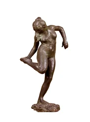 Danseres kijkt naar de zool van haar rechtervoet, ca. 1890