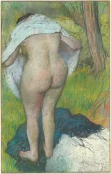 Jonge vrouw die zich aankleedt, 1885