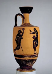 Attische zwartfigurige lekythos versierd met een oude man die een bal naar een jongeling gooit, ca. 500 v.Chr.