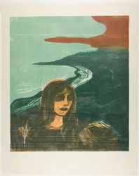 Het hoofd van een vrouw tegen de kust