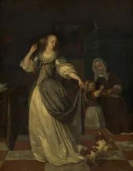 Dame met hond aan het spelen