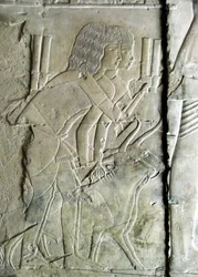 Egyptische oudheid: reliëf uit het graf van Kha em Het (Khaemhat) inspecteur van zolders en schrijver aan het hof van Amenophis III (TT57) mannen die bietenhoofden als offer aanbieden. 18e dynastie. 1530-1290 v.Chr. Vallei der Edelen. Luxor, Westoever, Egy