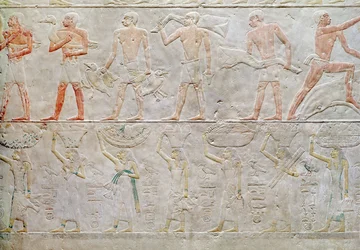 Reliëf dat mensen toont die voedseloffers dragen, uit de Mastaba van Akhethotep, Oude Rijk, ca. 2400 v.Chr. (geschilderd kalksteen)