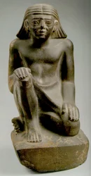 Prins Tjau Zittend (grauwacke)