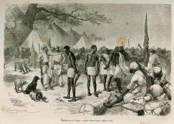 De brutale dragers van de expeditie aan de ketting gelegd, tekening door Emile Bayard, ter illustratie van het verhaal: Door Afrika, van Zanzibar (Tanzania) naar Benguela (Angola), van 1872 tot 1876, door Luitenant V.H.Cameron. Gravure in Le tour du monde