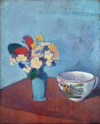Vaas met bloemen en kopje