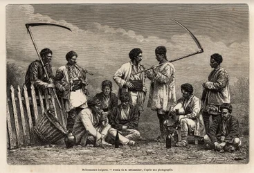 De Bulgaarse oogsters tijdens hun pauze, met hun zeis en de voorwerpen van hun dagelijkse arbeid: pijp, fles wijn en een soort doedelzak, gravure naar de tekening van E. Metzmacher, ter illustratie van de reis naar Bulgarije, door Guillaume Lejean, 18