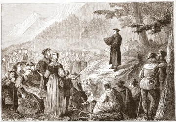 Een Zwitserse hervormer preekt voor zijn kudde in het open veld, illustratie uit De Geschiedenis van het Protestantisme door James Aitken Wylie, 1878