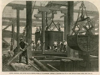 Het zinken van een cilinder voor een van de stenen pijlers