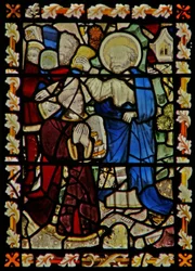 Het oostelijke raam met St. Petrus die een jonge man doopt