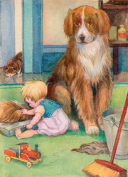 Peuter speelt met de staart van een hond