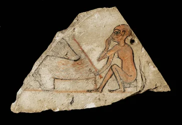 Ostracon met een jongen en een varken ...