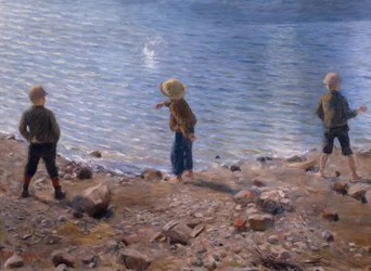Drie jongens op het strand