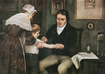 Dr. Edward Jenner (1749-1823) voert zijn eerste vaccinatie tegen pokken uit op James Phipps, een jongen van acht, 14 mei