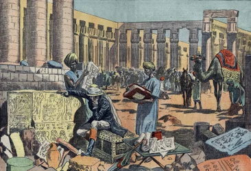 Jean Francois Champollion (1790-1832), een Franse egyptoloog, bestudeert een inscriptie tussen de zuilengalerijen van Thebe. Gravure uit 1923. Tekening van Damblans.