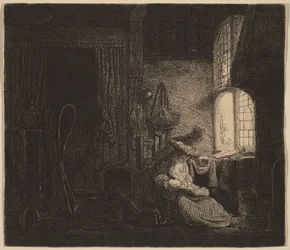 De familie in de kamer