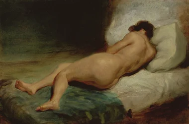 Naakte vrouw liggend op een bed