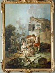 Een man die druiven aanbiedt aan een meisje