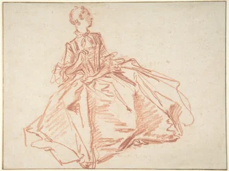 Zittende vrouw met een waaier in haar hand