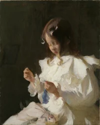 Portret van een naaiend kind
