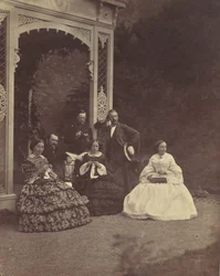 [Portret van drie vrouwen en mannen in een tuin], 1850s-60s