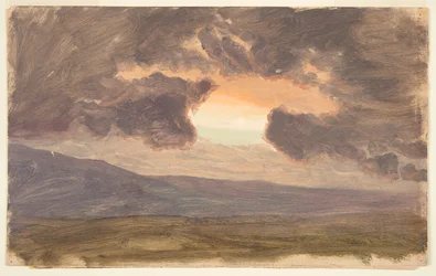 Zonsondergang over kale heuvels