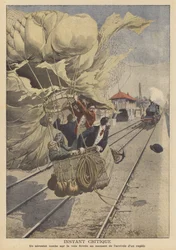 Een ballon landt op een spoorlijn in het pad van een naderende sneltrein