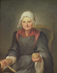 Een oude vrouw aan het spinnen