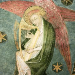 Engel muzikant die harp speelt (detail)