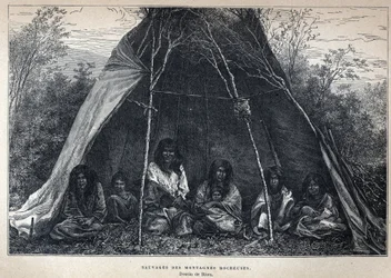 Ontdek Canada: Amerikaanse Indianen die in de Rockies wonen. Gravure uit het einde van de 19e eeuw in La nouvelle France door Eugene Guenin