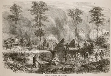 Houtskool maken voor buskruit, illustratie uit Cassells Geschiedenis van de Oorlog tussen Frankrijk en Duitsland, 1870-1871