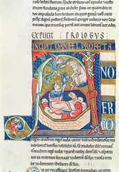 Historiated initiaal A met Daniël in de leeuwenkuil, uit de Souvigny Bijbel