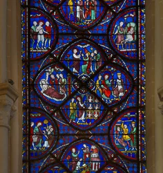 Glas-in-lood van de kathedraal van Chartres: detail van het leven van Sint-Thomas