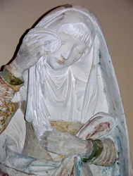 De graflegging, detail van een vrouwelijke heilige