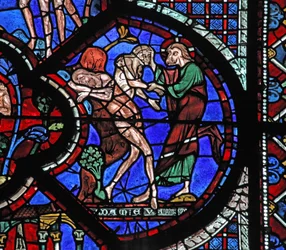Het raam van de barmhartige Samaritaan: God schept vrouw uit de rib van de slapende Adam