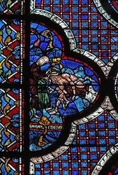 Het raam van de barmhartige Samaritaan: een Samaritaan verbindt zijn wonden
