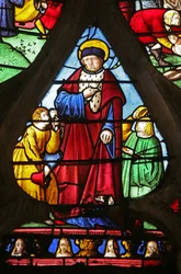Het Sint Louis raam: Sint Louis verricht goede daden