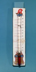Thermometer bekroond met een Frygische muts